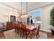 Elegant dining room with hardwood floors and large windows at 6 Driver Ln, Littleton, CO 80123