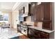 Spacious kitchen with stainless steel appliances and custom cabinetry at 6 Driver Ln, Littleton, CO 80123