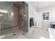 Large walk-in shower with a built-in seat at 6 Driver Ln, Littleton, CO 80123