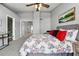 Inviting bedroom with neutral colors and ample space, accentuated by a comfortable bed and stylish decor, for relaxation at 5555 E Briarwood Ave # 2604, Centennial, CO 80122