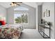Light-filled bedroom with a vaulted ceiling, large window, and stylish decor, creating a cozy and inviting atmosphere at 5555 E Briarwood Ave # 2604, Centennial, CO 80122