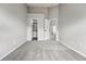 Neutral bedroom with walk-in closet and light grey carpet at 5555 E Briarwood Ave # 2604, Centennial, CO 80122