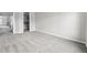 Spacious bedroom with closet, featuring neutral-colored carpeting at 5555 E Briarwood Ave # 2604, Centennial, CO 80122