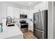 Contemporary kitchen featuring stainless steel appliances, sleek countertops, and modern fixtures for a stylish cooking experience at 5555 E Briarwood Ave # 2604, Centennial, CO 80122