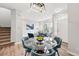 Inviting living room featuring a comfortable sofa, large windows, and an open floor plan connecting to the dining area at 5555 E Briarwood Ave # 2604, Centennial, CO 80122