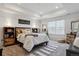 Charming bedroom with a bed, stylish decor, and soft lighting at 3377 S Quartz St, Morrison, CO 80465