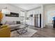 Cozy living room features a modern design, with sleek appliances and updated finishes at 3377 S Quartz St, Morrison, CO 80465