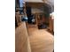 Cozy interior view featuring a wood-paneled kitchen and stairs, creating a warm, inviting atmosphere at 4568 Apex Valley Rd, Golden, CO 80403