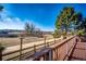 Inviting back deck showcasing stunning community trail and a serene landscape view for relaxing outdoors at 23612 Glenmoor Dr, Parker, CO 80138