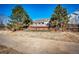 A welcoming deck is perfect for outdoor enjoyment and complements the backyard space at 23612 Glenmoor Dr, Parker, CO 80138