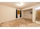 Unfinished basement area with shelving provides room for storage and customization at 23612 Glenmoor Dr, Parker, CO 80138