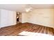 Bedroom with laminate flooring, a ceiling fan, wall shelves, a large closet and neutral paint colors at 23612 Glenmoor Dr, Parker, CO 80138