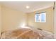 Bright bedroom featuring a window, allowing natural light, awaiting your decorative ideas at 23612 Glenmoor Dr, Parker, CO 80138