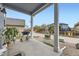 Backyard patio area, perfect for outdoor lounging and grilling, complete with a grill and potted plant at 277 Jewel St, Brighton, CO 80603