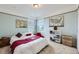 Bedroom boasting ample natural light, complementing the cozy decor and creating a warm, inviting atmosphere at 277 Jewel St, Brighton, CO 80603