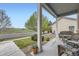 Relaxing front porch featuring comfortable seating and a view of the neighborhood at 277 Jewel St, Brighton, CO 80603