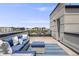 Stylish rooftop deck with lounge seating and scenic city views, perfect for entertaining at 3008 Blake St, Denver, CO 80205