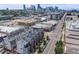 Street view of row houses with rooftop patios and modern architecture at 3008 Blake St, Denver, CO 80205