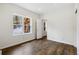 Bright bedroom with wood floors and a large window view of the outdoors at 6087 Highway 9, Breckenridge, CO 80424