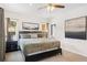 Comfortable bedroom featuring a plush bed, dark wood furniture, and recessed lighting at 6087 Highway 9, Breckenridge, CO 80424