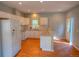 Kitchen with white cabinets, granite countertops, and modern appliances at 6087 Highway 9, Breckenridge, CO 80424