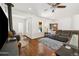 Cozy living room featuring wood floors, a wood-burning fireplace, and comfortable seating at 6087 Highway 9, Breckenridge, CO 80424