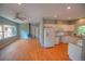 Open living space with a combined living room and kitchen featuring hardwood floors at 6087 Highway 9, Breckenridge, CO 80424