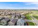 High angle view of a residential area with neat houses, lush landscaping, and community amenities, promoting a peaceful environment at 12678 Fisher Ln, Englewood, CO 80112