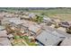 Overhead view of homes with spacious yards, complemented by scenic roads and community spaces, ideal for relaxed suburban living at 12678 Fisher Ln, Englewood, CO 80112
