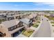 Expansive aerial view of a residential neighborhood showcasing well-maintained homes and streets, perfect for families and community living at 12678 Fisher Ln, Englewood, CO 80112