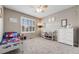 A bedroom is bright and spacious with a Spiderman themed bed at 12678 Fisher Ln, Englewood, CO 80112