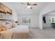 Serene main bedroom with an sitting room, lots of natural light, and neutral decor at 7099 Cerney Cir, Castle Pines, CO 80108