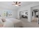 Spacious main bedroom with an attached sitting room and bright natural light at 7099 Cerney Cir, Castle Pines, CO 80108