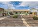 Charming single-story home with a covered carport and a well-maintained front yard at 1931 Dayton St, Aurora, CO 80010