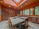 Spacious kitchen with large island, granite countertops, and custom wood cabinets at 32453 Upper Bear Creek Rd, Evergreen, CO 80439
