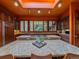 Gourmet kitchen features a large island, modern appliances, and natural light at 32453 Upper Bear Creek Rd, Evergreen, CO 80439
