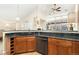 Kitchen area showcases granite countertops, stainless steel appliances, and vaulted ceiling at 8643 Gold Peak Dr # E, Highlands Ranch, CO 80130