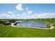 Scenic lake with walking paths and recreational area at 5155 E 115Th Ave, Thornton, CO 80233