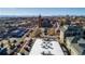 Aerial shot of a neighborhood featuring a church, mountain views, and streetscapes at 2901 N Wyandot St # 19, Denver, CO 80211