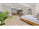 Spacious open-concept bedroom features a small sitting area, kitchen and dining area at 2901 N Wyandot St # 19, Denver, CO 80211