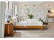 Cozy bedroom featuring modern decor, a comfortable bed, and natural light at 2901 N Wyandot St # 19, Denver, CO 80211