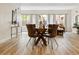 Chic dining area with a glass table, seating for four, and bright natural lighting at 2901 N Wyandot St # 19, Denver, CO 80211