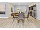 Dining area connected to the kitchen, featuring a stylish table and comfortable seating at 2901 N Wyandot St # 19, Denver, CO 80211