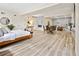 Bright living space boasts an open floor plan with wood floors and stylish decor at 2901 N Wyandot St # 19, Denver, CO 80211