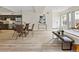 Inviting open space with dining area, kitchen view, and contemporary design elements at 2901 N Wyandot St # 19, Denver, CO 80211