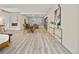 Open-concept living area with a dining table and natural light throughout the unit at 2901 N Wyandot St # 19, Denver, CO 80211