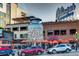 Vibrant street scene with outdoor dining and city views, capturing the lively neighborhood at 2901 N Wyandot St # 19, Denver, CO 80211
