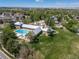 Aerial view of community pool, clubhouse and playground at 12663 S Silver Creek Ct, Parker, CO 80134