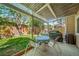 Backyard featuring a covered patio, outdoor seating, a grill, and a fenced-in yard at 12663 S Silver Creek Ct, Parker, CO 80134