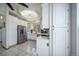 Well-lit kitchen featuring stainless steel appliances, ample cabinet space, and bright lighting at 12663 S Silver Creek Ct, Parker, CO 80134